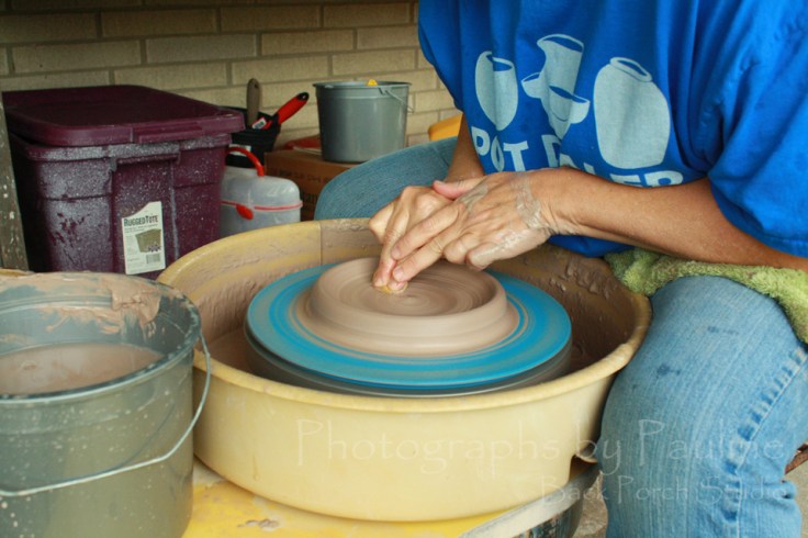 Compressing the bottom to ensure evenness. 