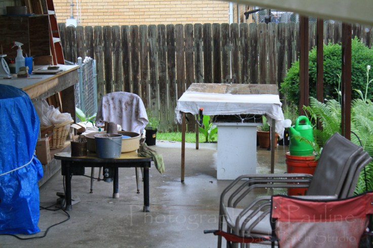 It rained and it poured!  You can see how far I had to scoot my wheel over due to the rain blowing into my back porch studio.