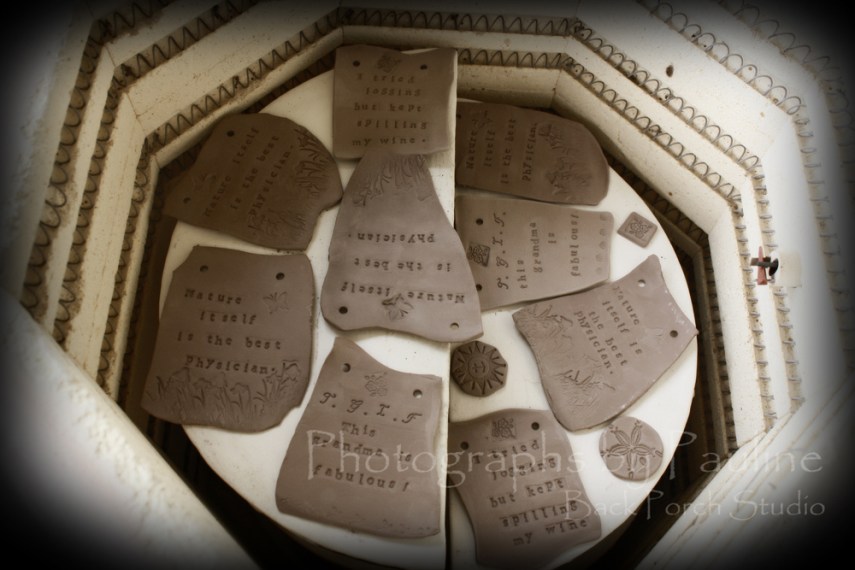 Whimsical Inspirational Wall Art Plaques in the kiln.