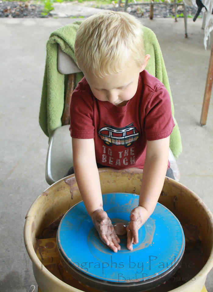 Little hands covered in mud too!