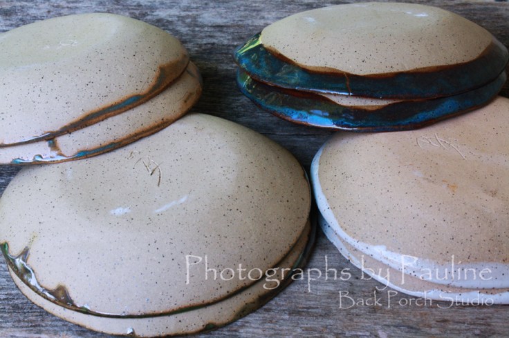 I can not decide whether to go with an ‘organic’ flow of the glaze on the underside of the bowls or go with a clean cut – no glaze on the underside. Any thoughts? 