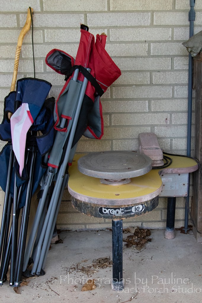My pottery wheel patiently waiting along with the soccer chairs.